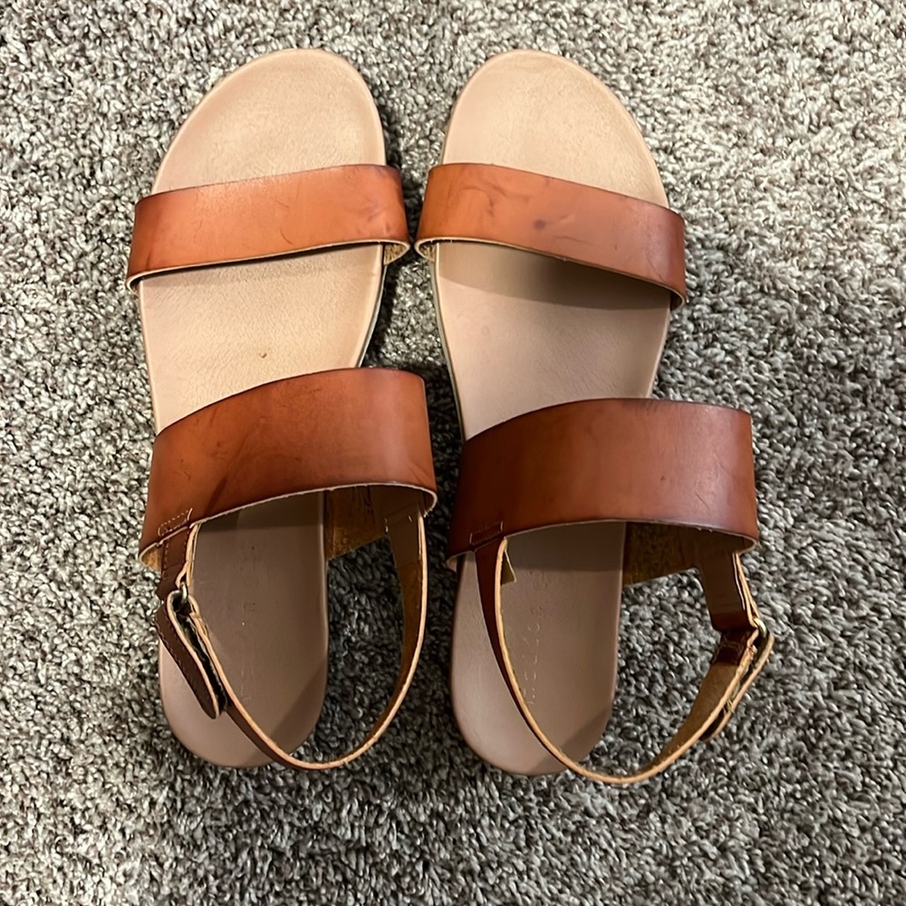 Two strapped sandals